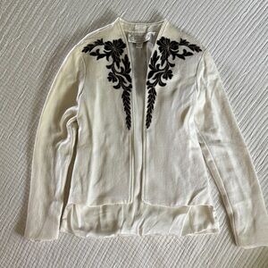 Elegant White Jacket with Black Floral Design